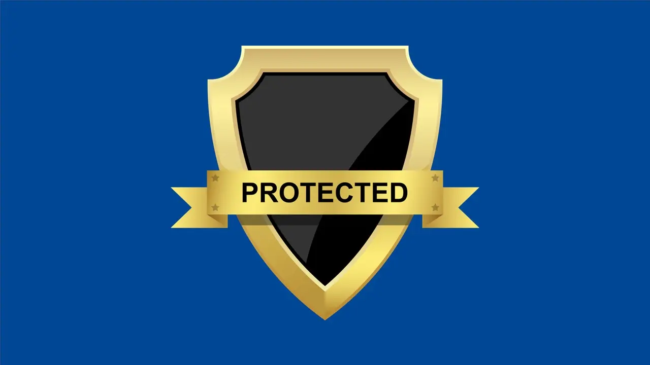 Das Foto zeigt auf blauem Hintergrund eine Art von Logo oder Schutzschild in Gold und Schwarz mit der Schrift Protected.